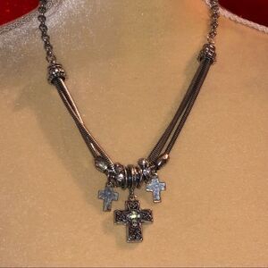 Goth style silver metal necklace with cross
